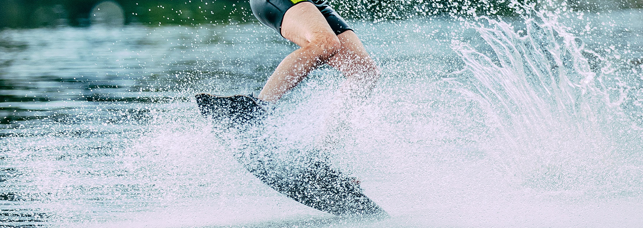 man-jumps-on-wakeboard-wave-